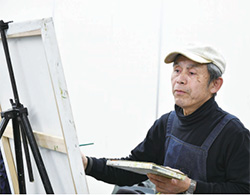絵を描く男性