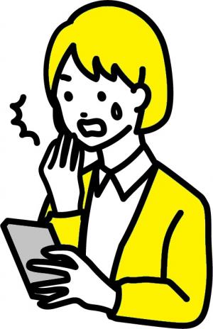スマホを見て驚く女性